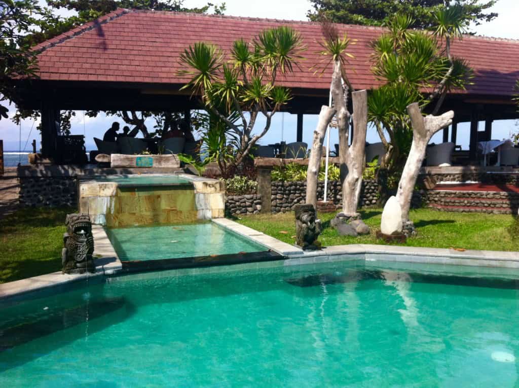 A swimming pool with water feature in Sanur
