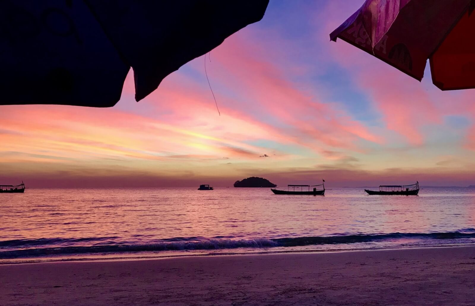 Otres Beach with a rainbow sky while travelling in Cambodia