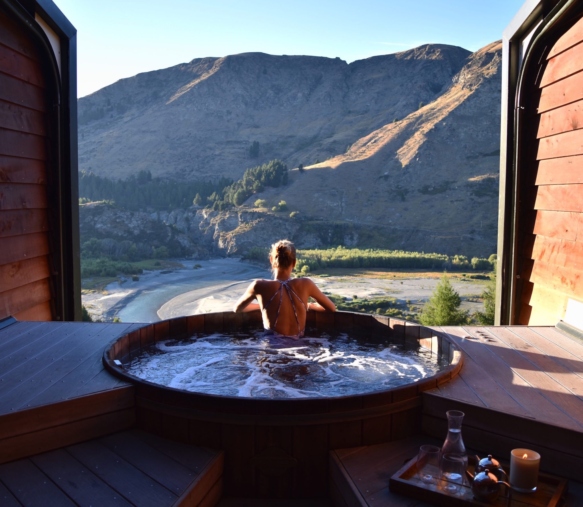 Hayley relaxing in the Onsen Hot Pools, looking out over the valley below