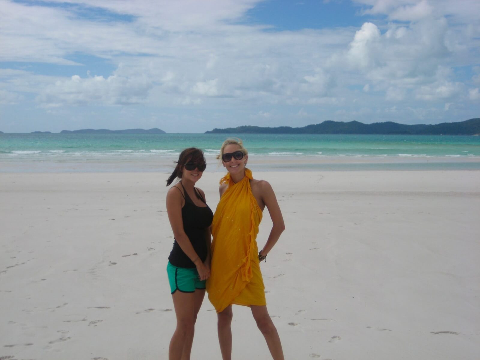 Hayley and Vicky on the white sands of Whitehaven Beach in the Whitsundays