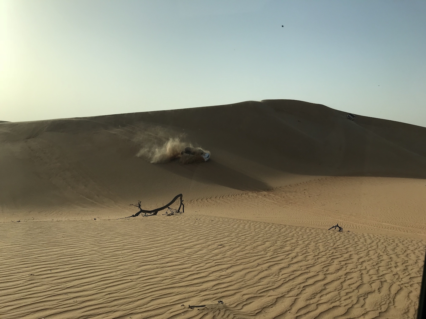 Driving over the huge sand dunes in a 4x4