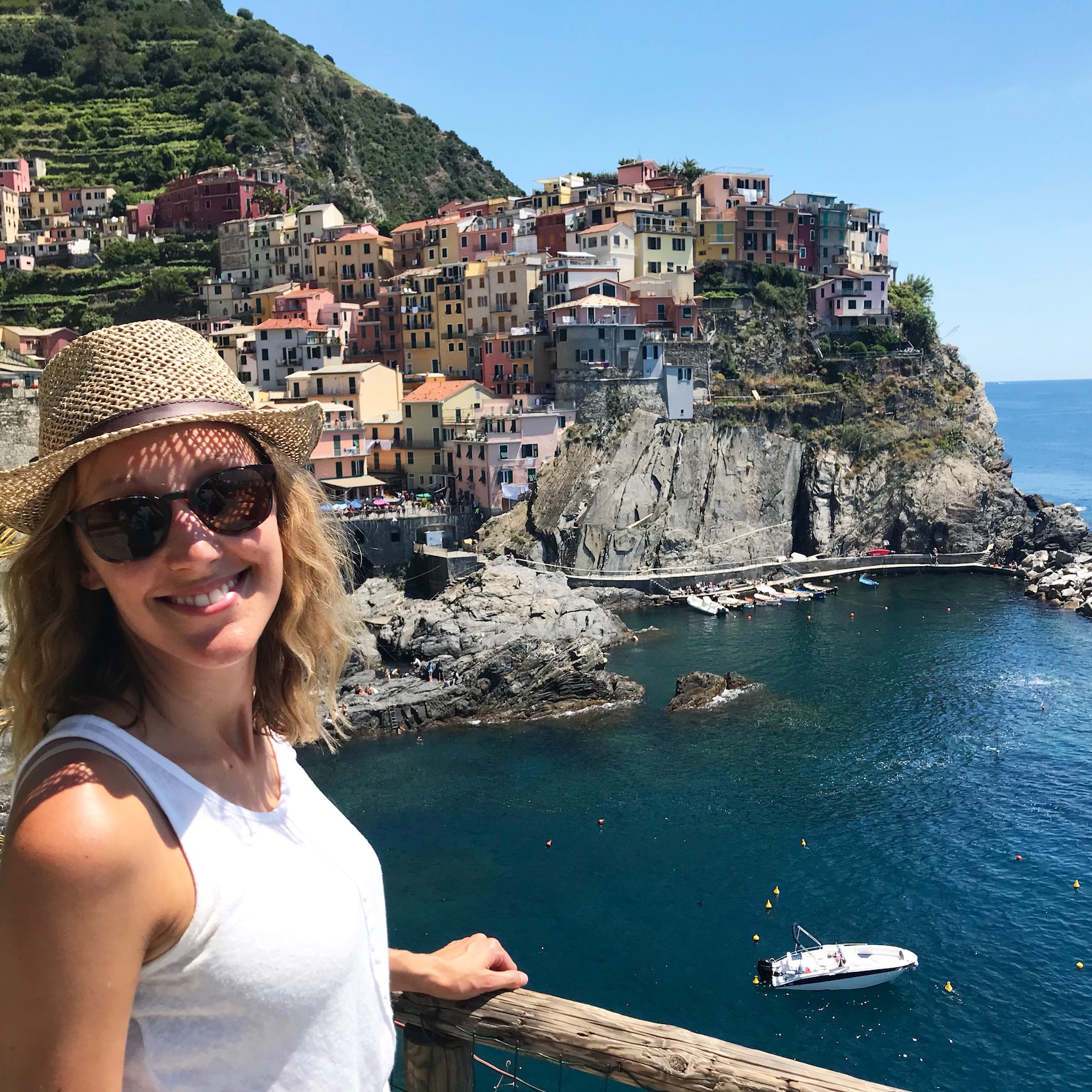 Hayley wearing a straw hat in Italy 