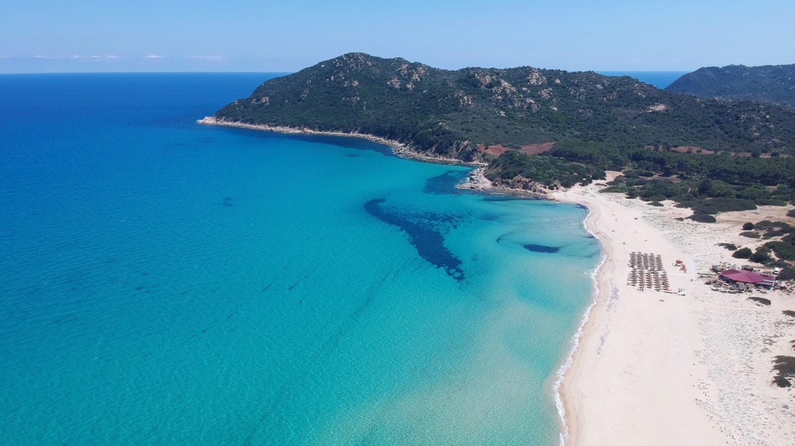 A white sand beach from above in Sardinia