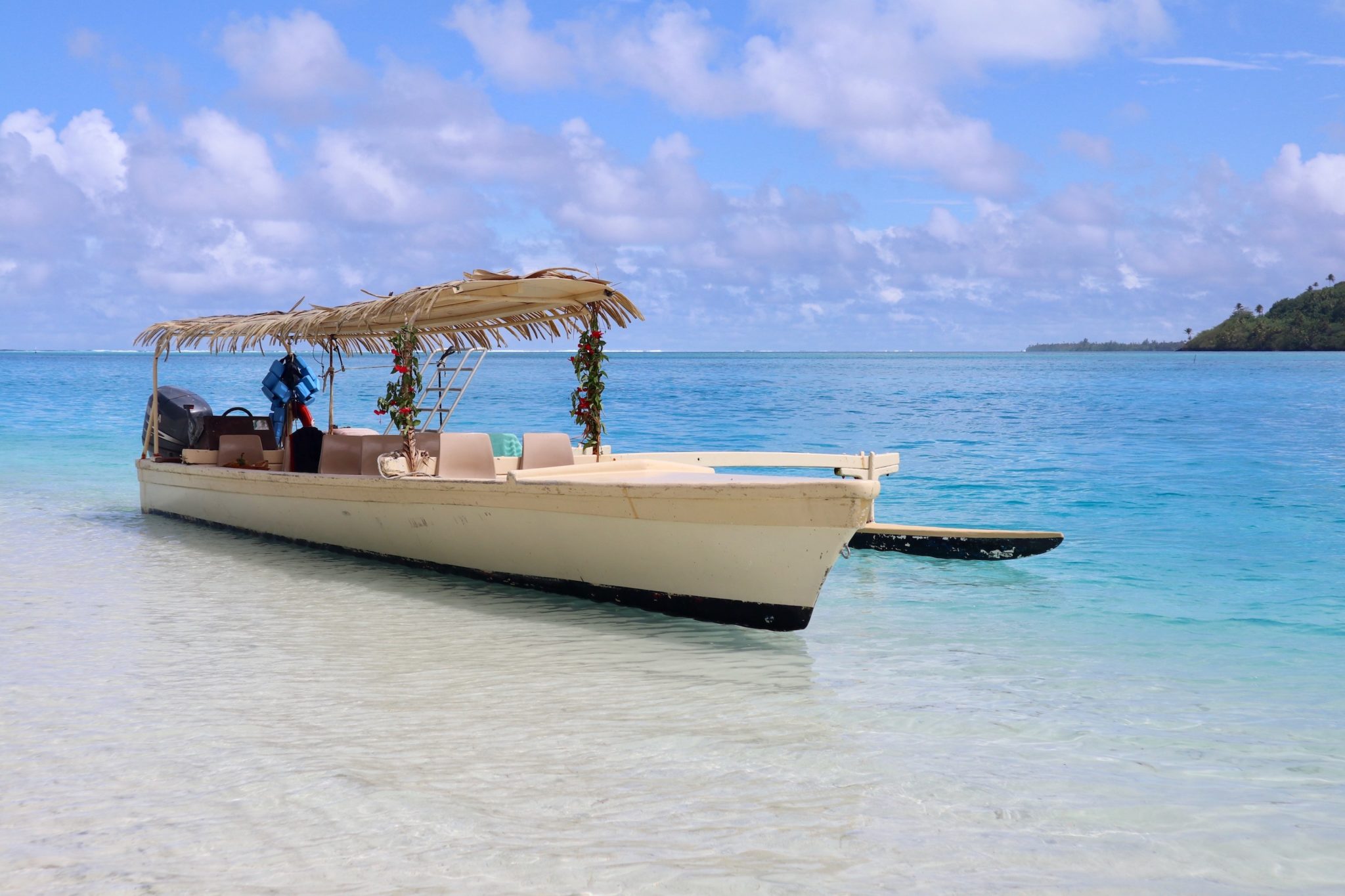 A traditional outrigger canoe style boat