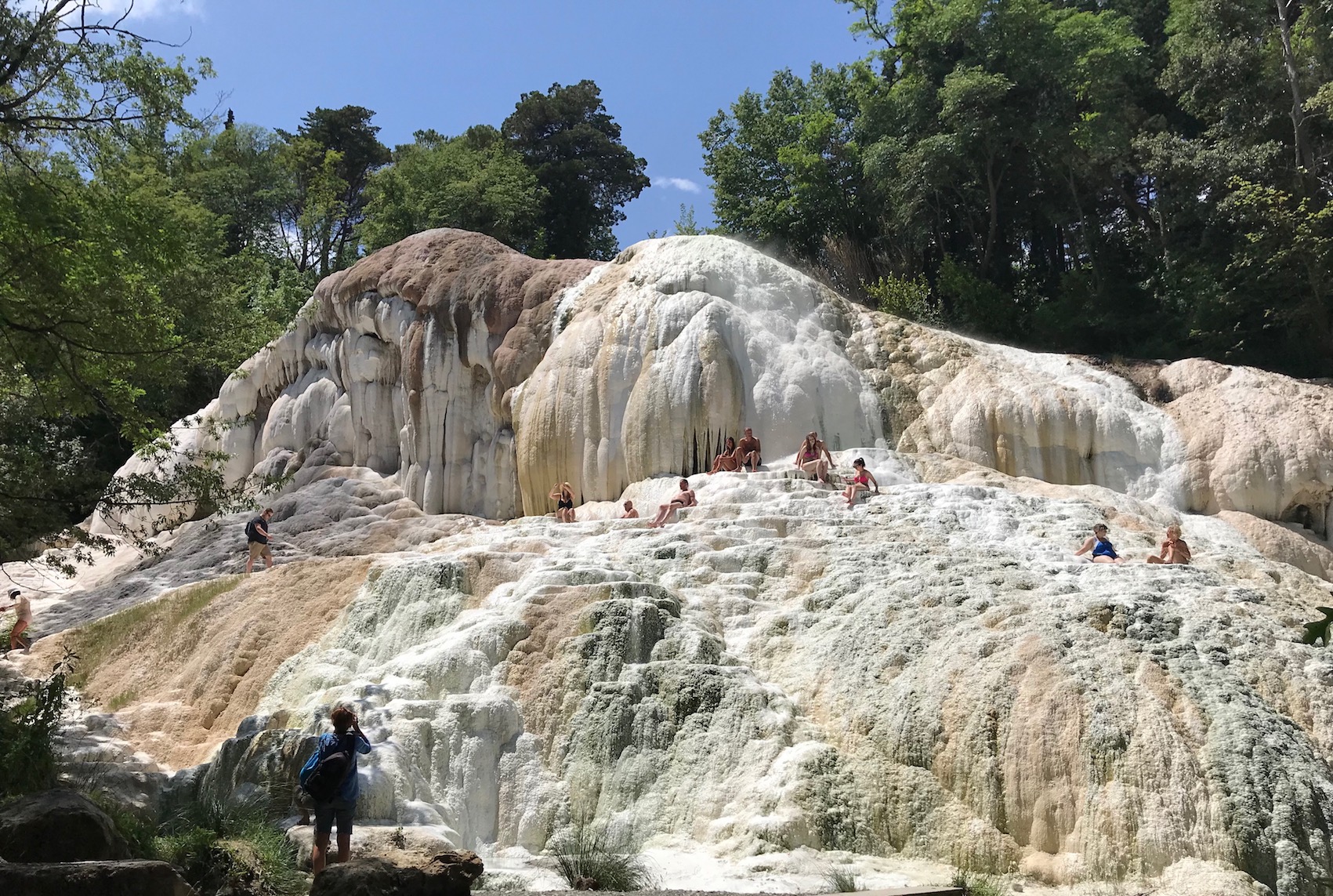 Locals enjoy the warming waters of Bagni San Filippo