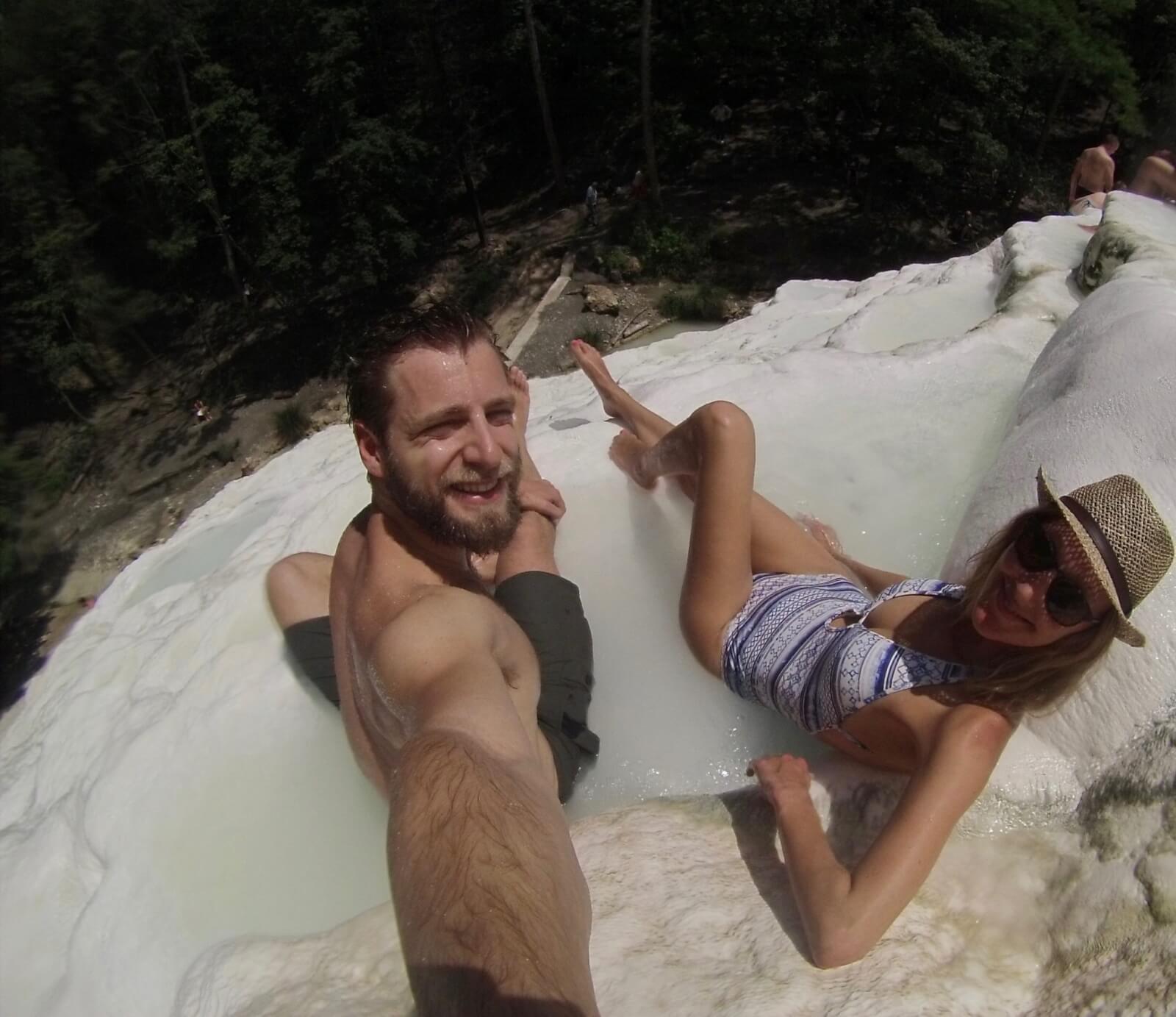 An aerial shot of Hayley and Enrico at Tuscany's thermal springs