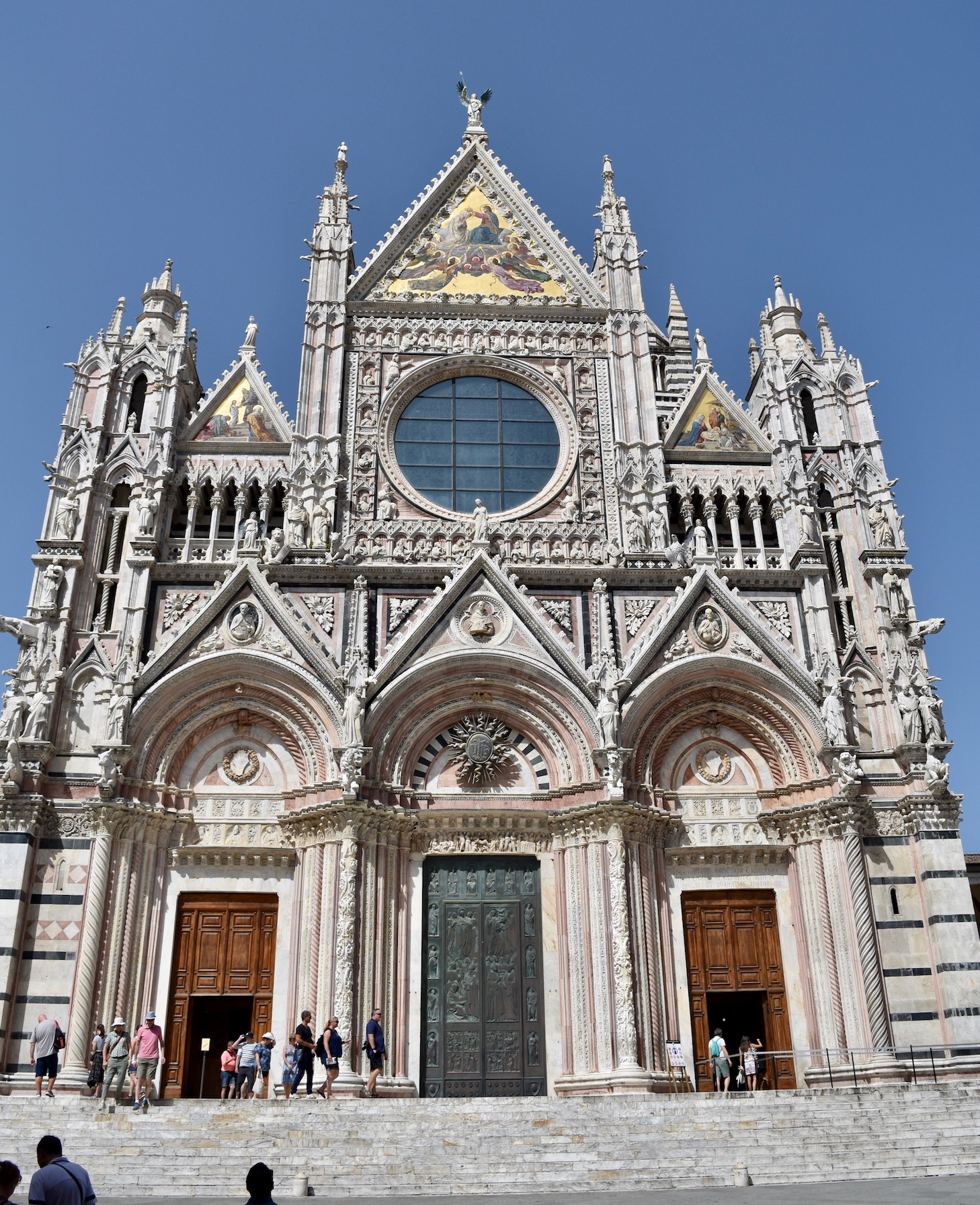 The incredibly ornate facade of the Santa Maria Assunta Cathedral in Siena 