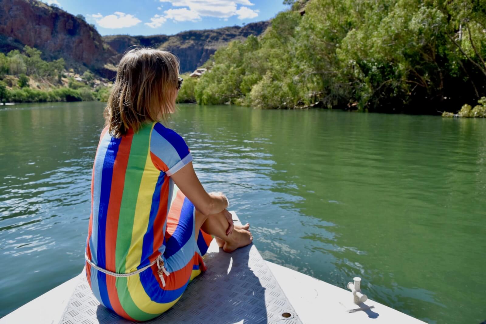 Hayley sitting on the front of the boat in the Ord River 