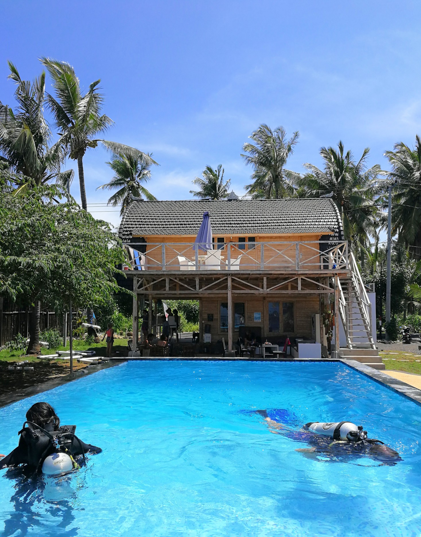 Divers training in a swimming pool