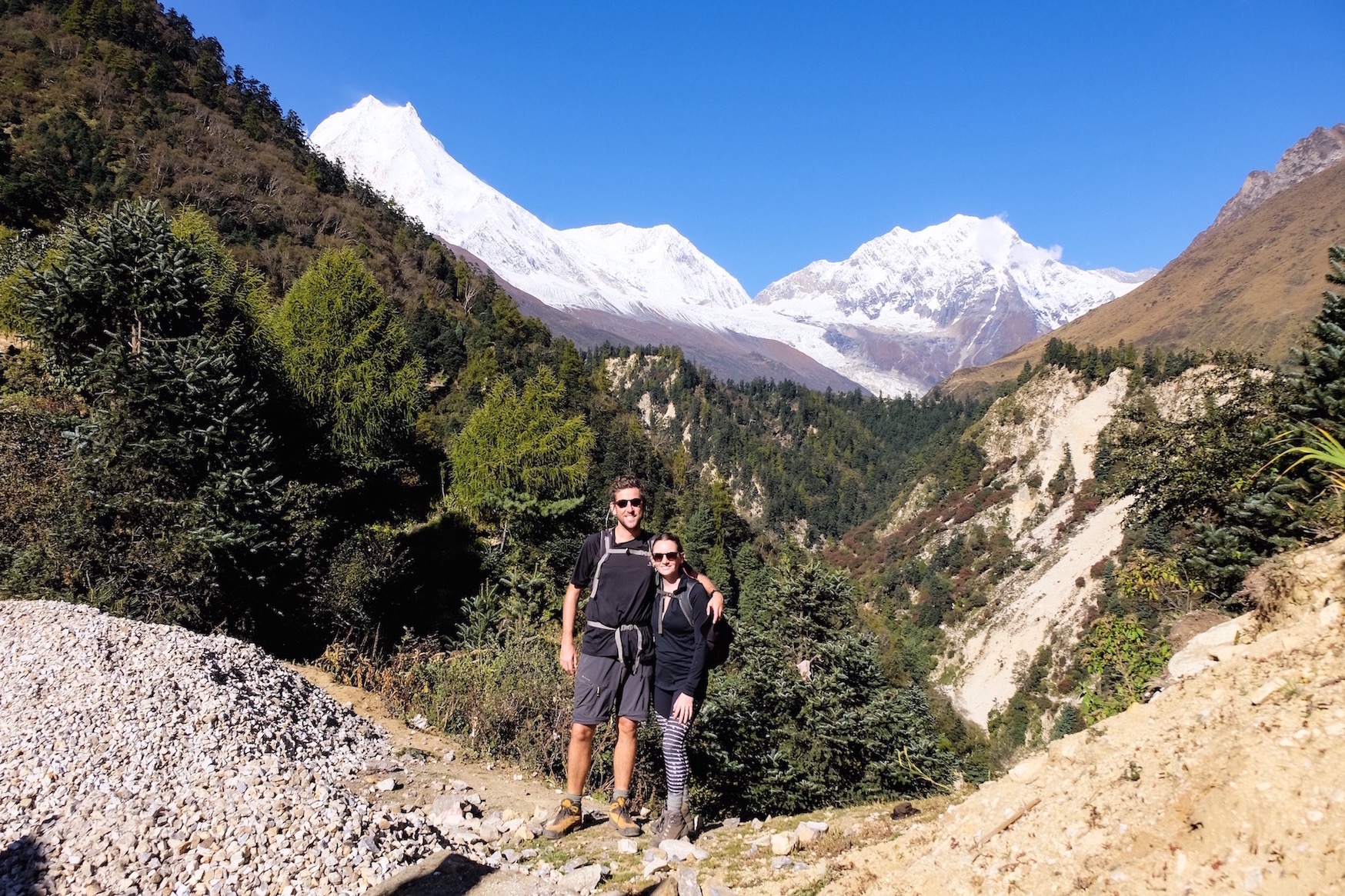 Hikers with a mountain backdrop