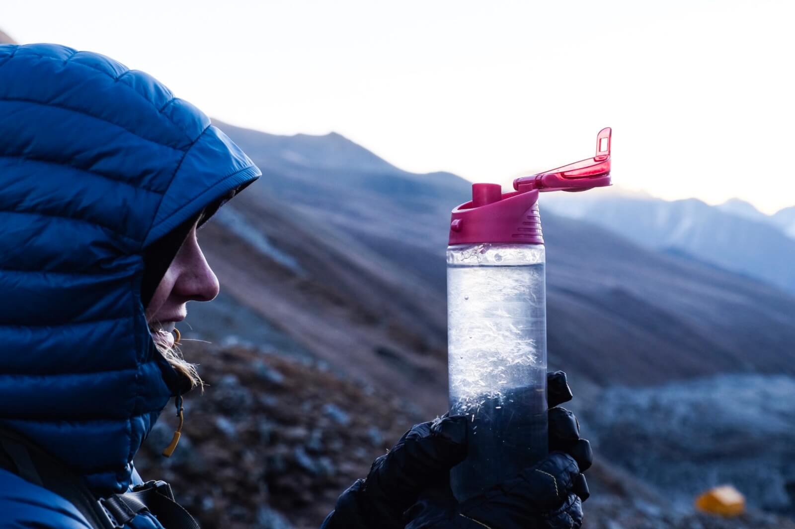 A water bottle filled with frozen water