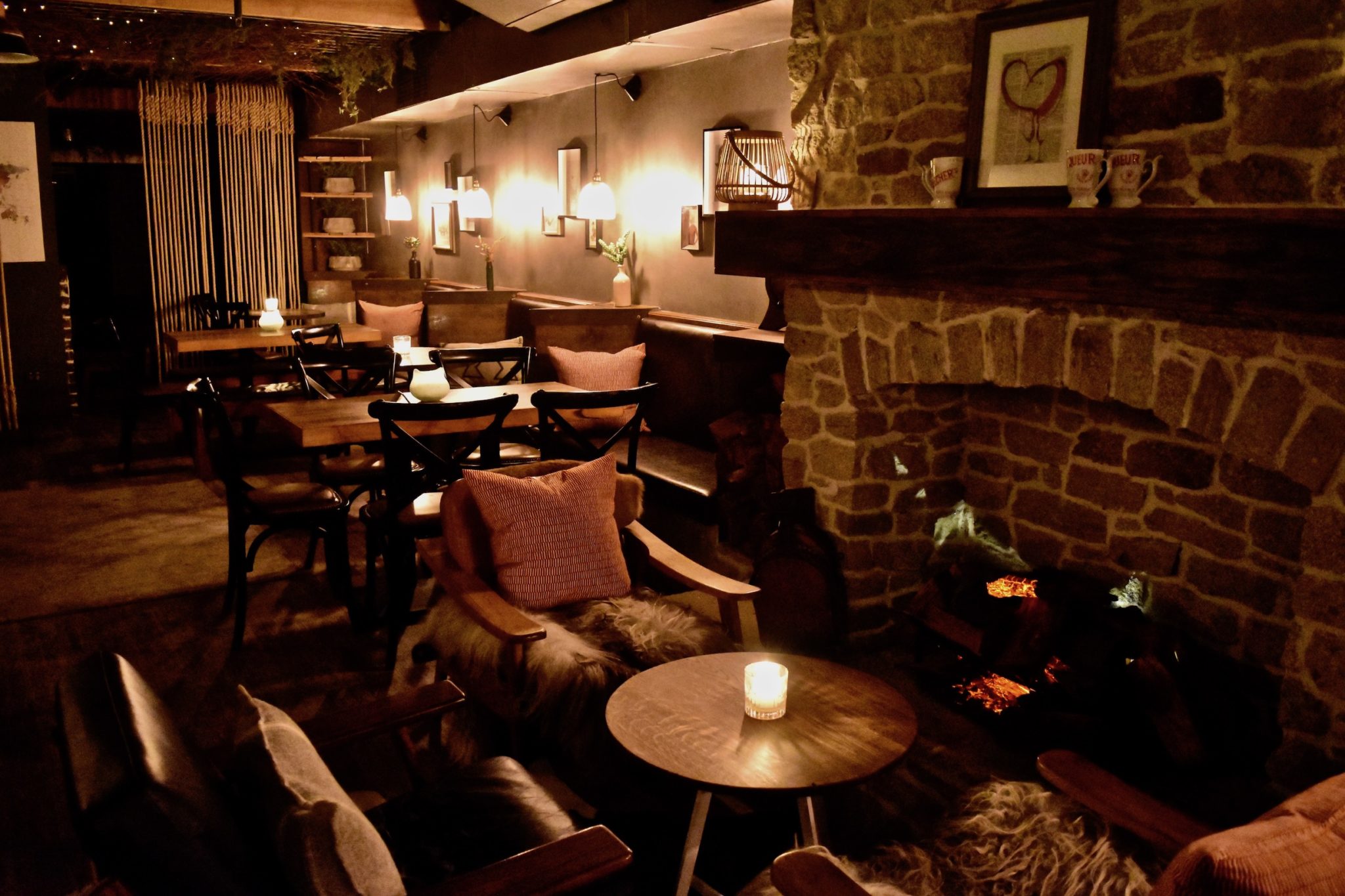 A cosy fireplace in a bar