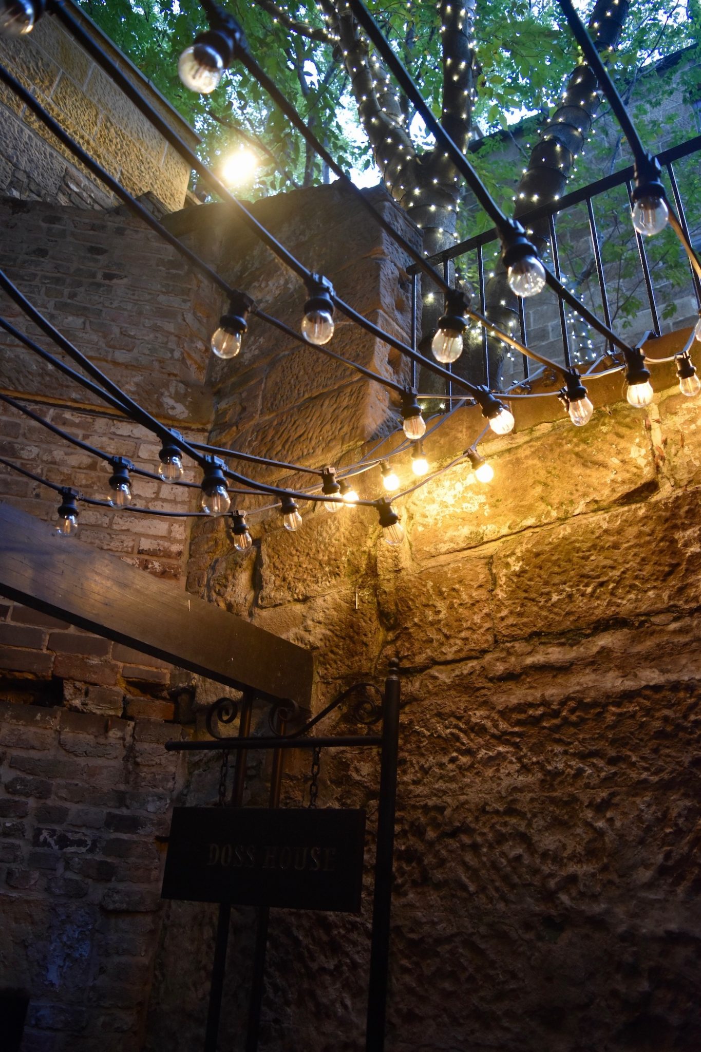 Hanging lights in a courtyard