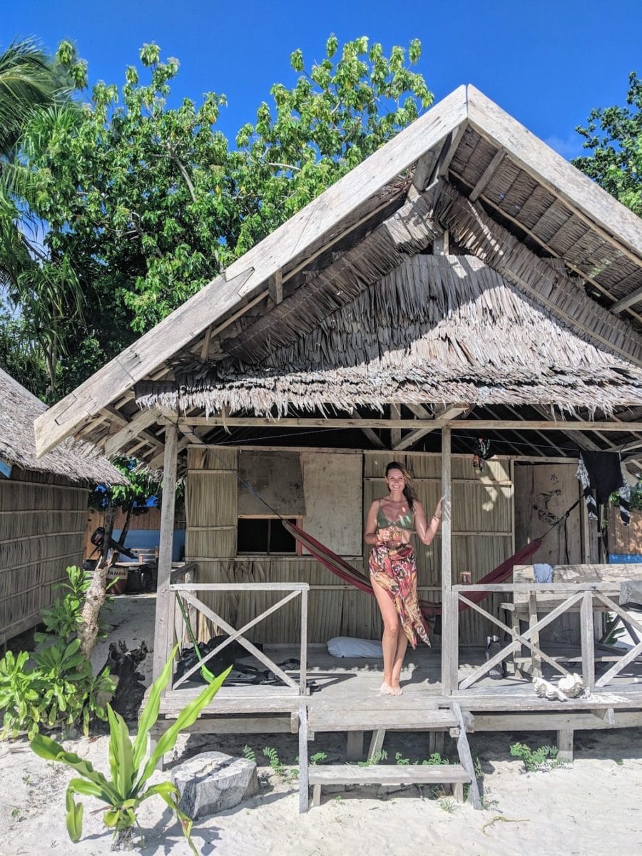 Sarah standing at the front of a beach hut 