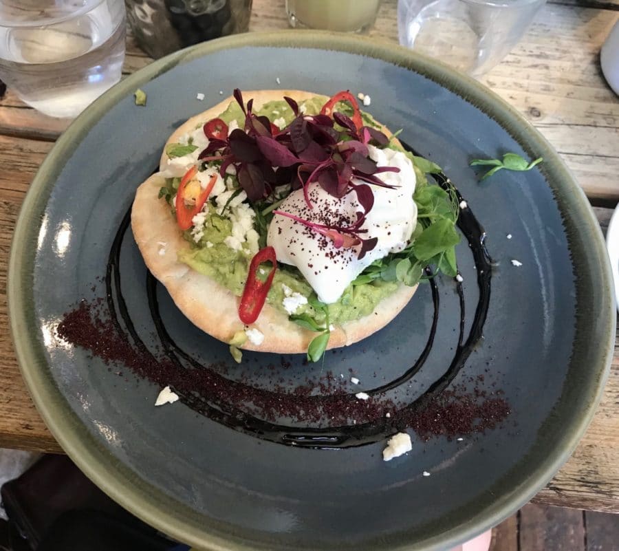 Poached eggs and avocado served on a pitta at Cafe Coho