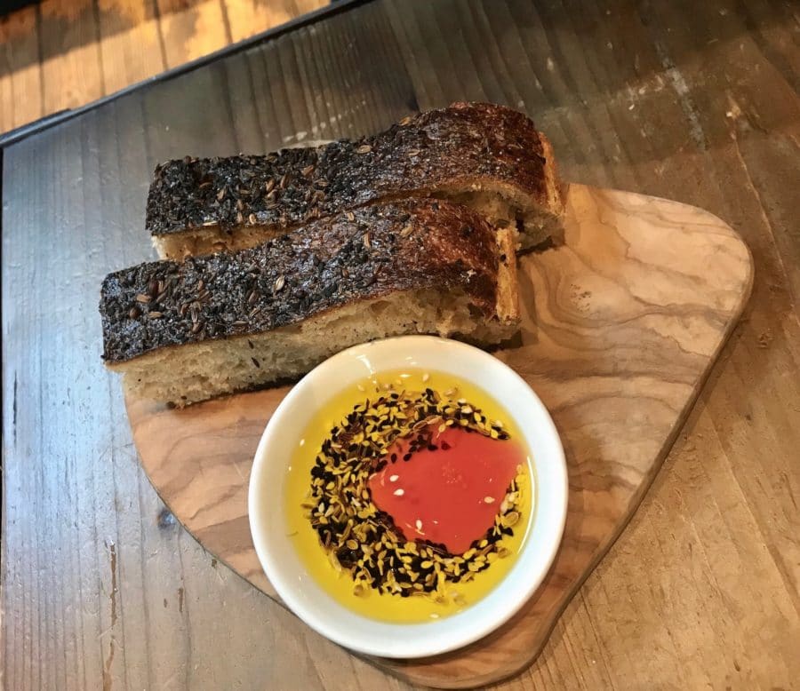 Homemade bread served with oil and balsamic at Plateau