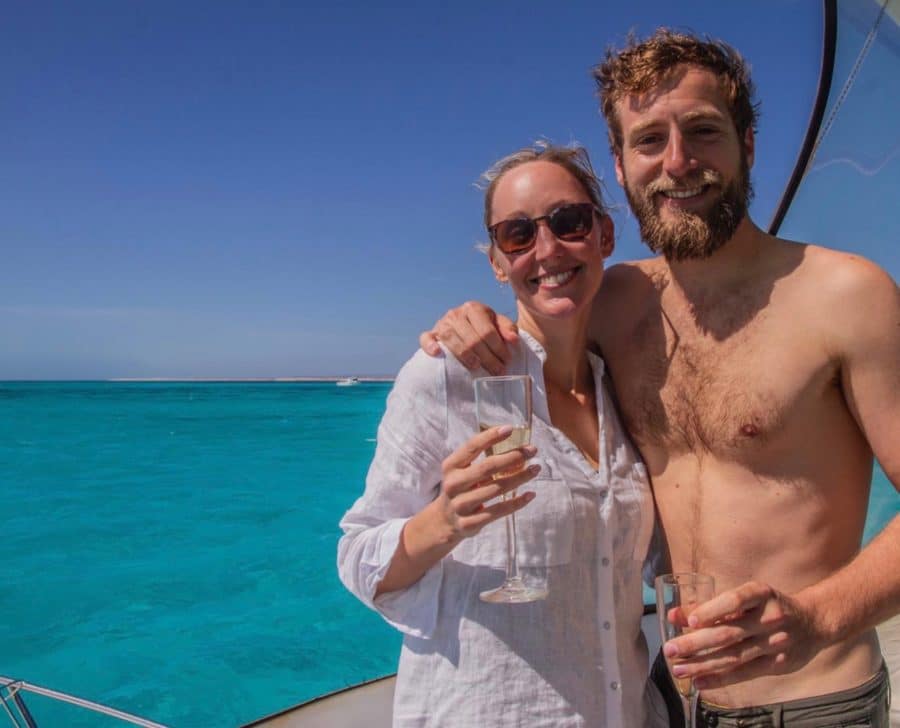 Hayley and Enrico enjoying wine on the Live Ningaloo boat.