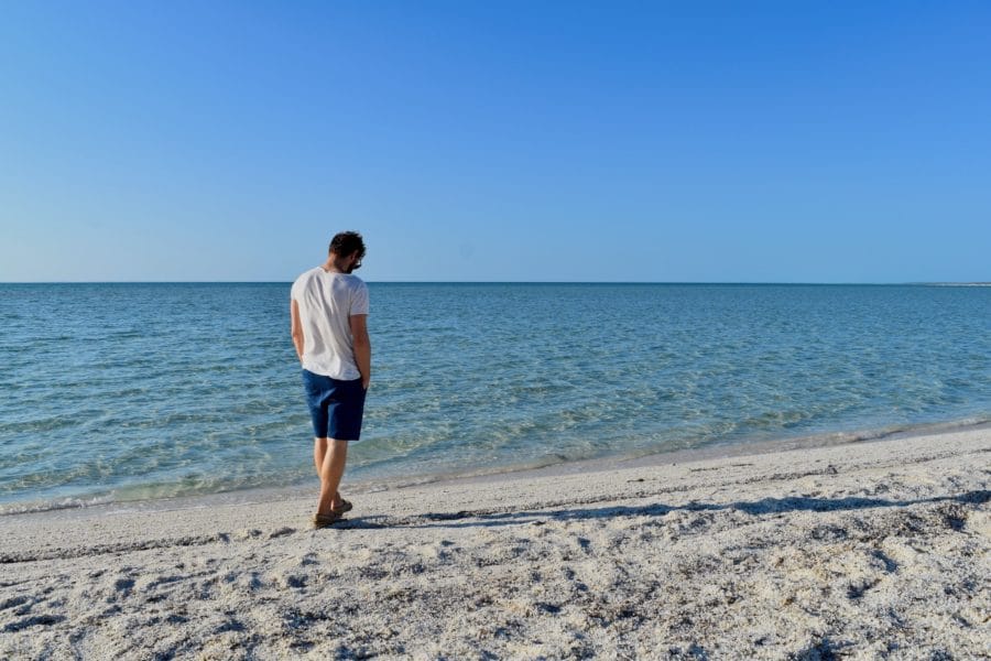 Enrico walking on the shells at Shell Beach 