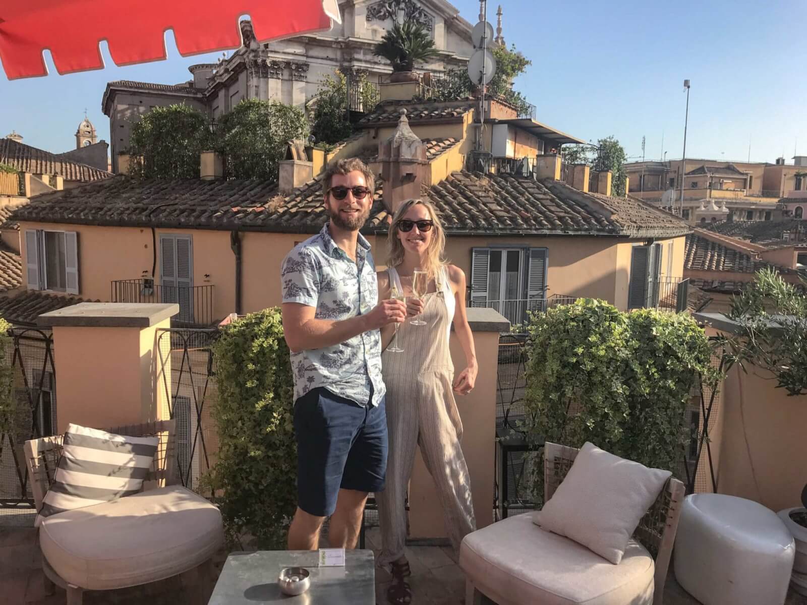 Hayley and Enrico in a rooftop bar in Rome