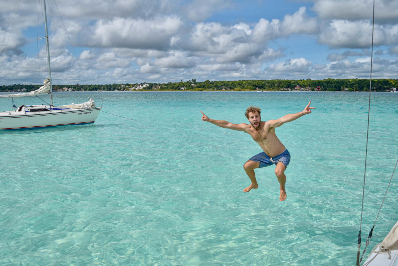 Enrico jumping into lake Bacalar 