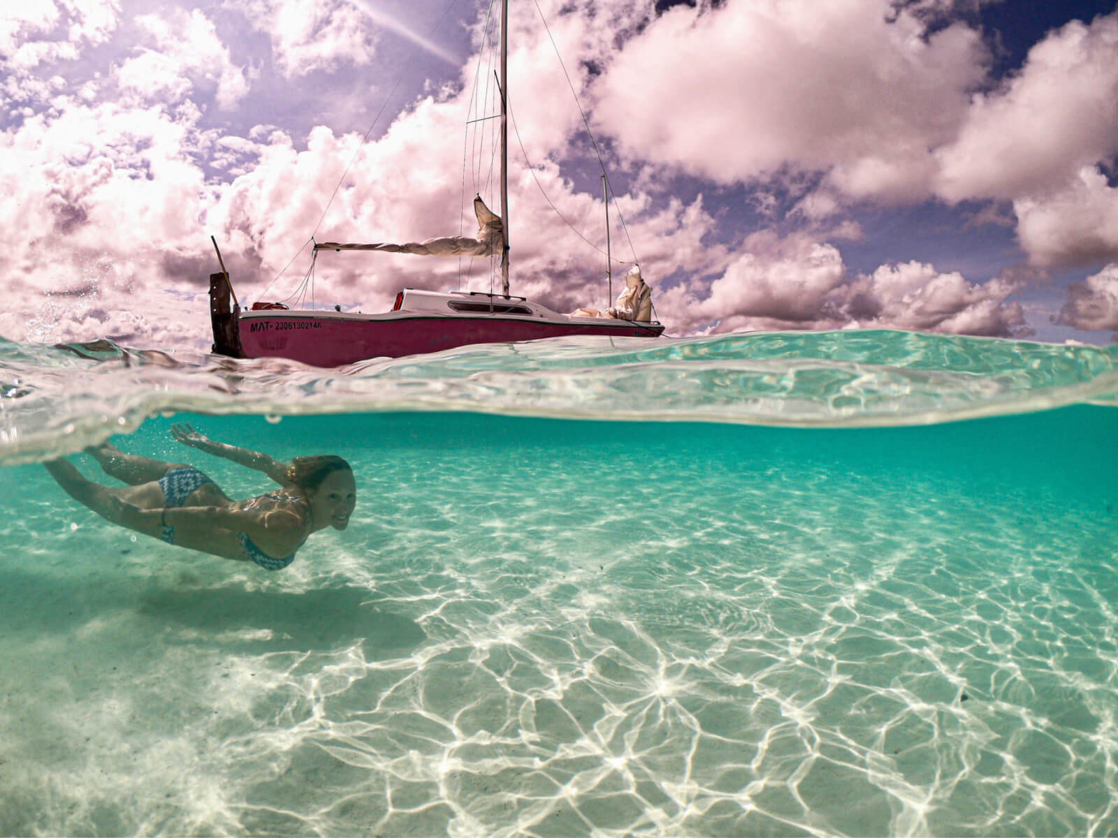 Hayley swimming underwater in lake Bacalar 