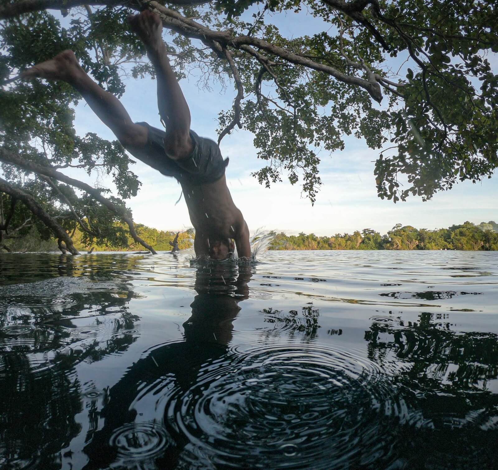 Enrico diving into cenote azul