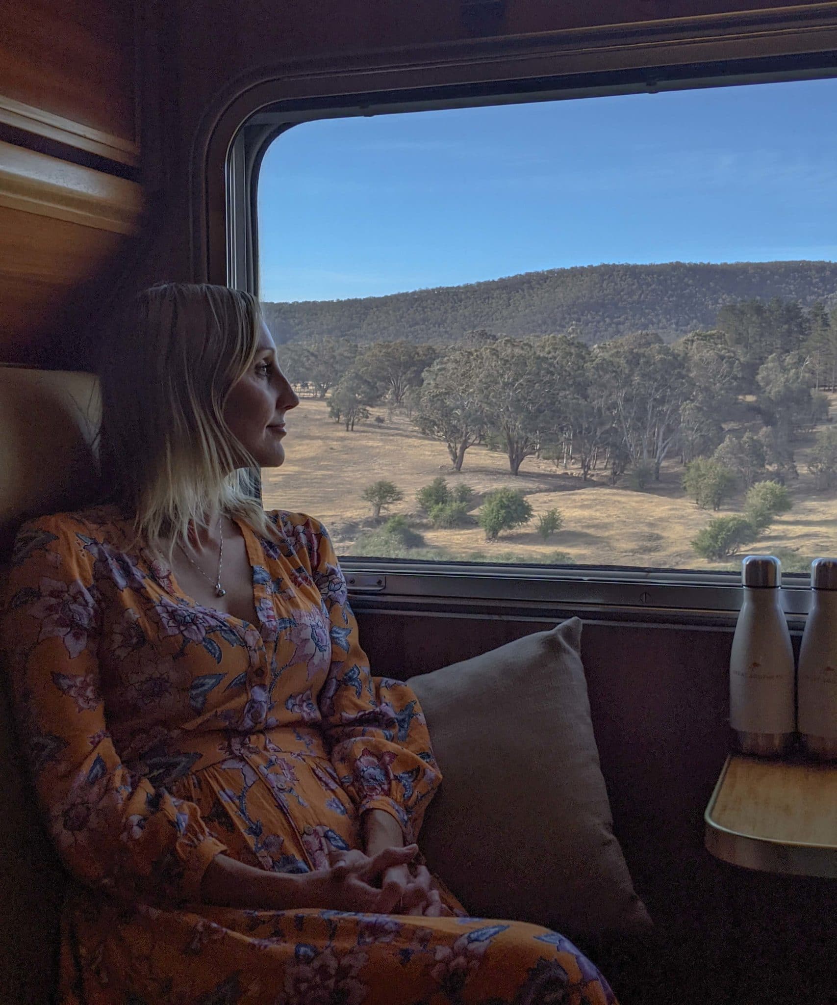 Hayley gazing out the window of the Gold cabin aboard the Great Southern