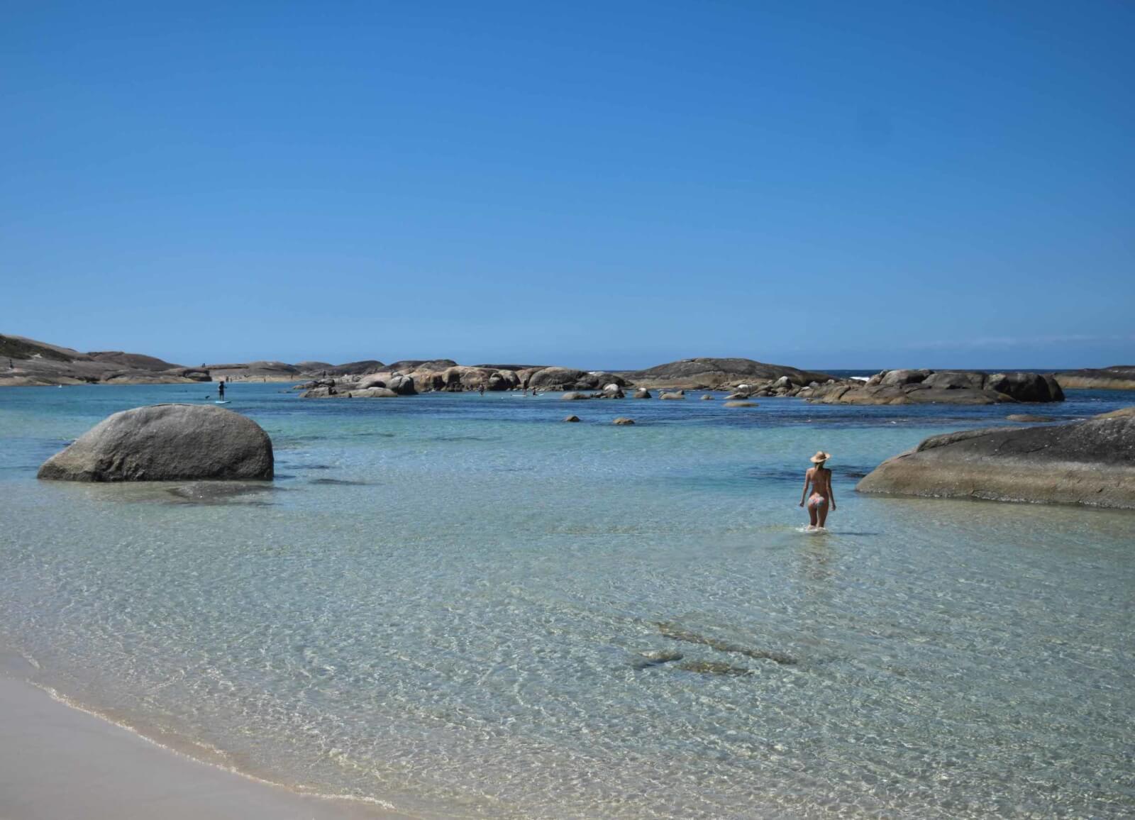 Hayley walking into the water at Greens Pool