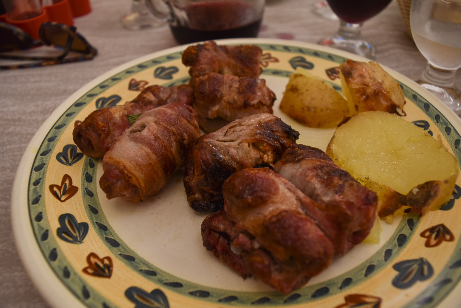A plate of bombette - meat parcels - with potatoes 