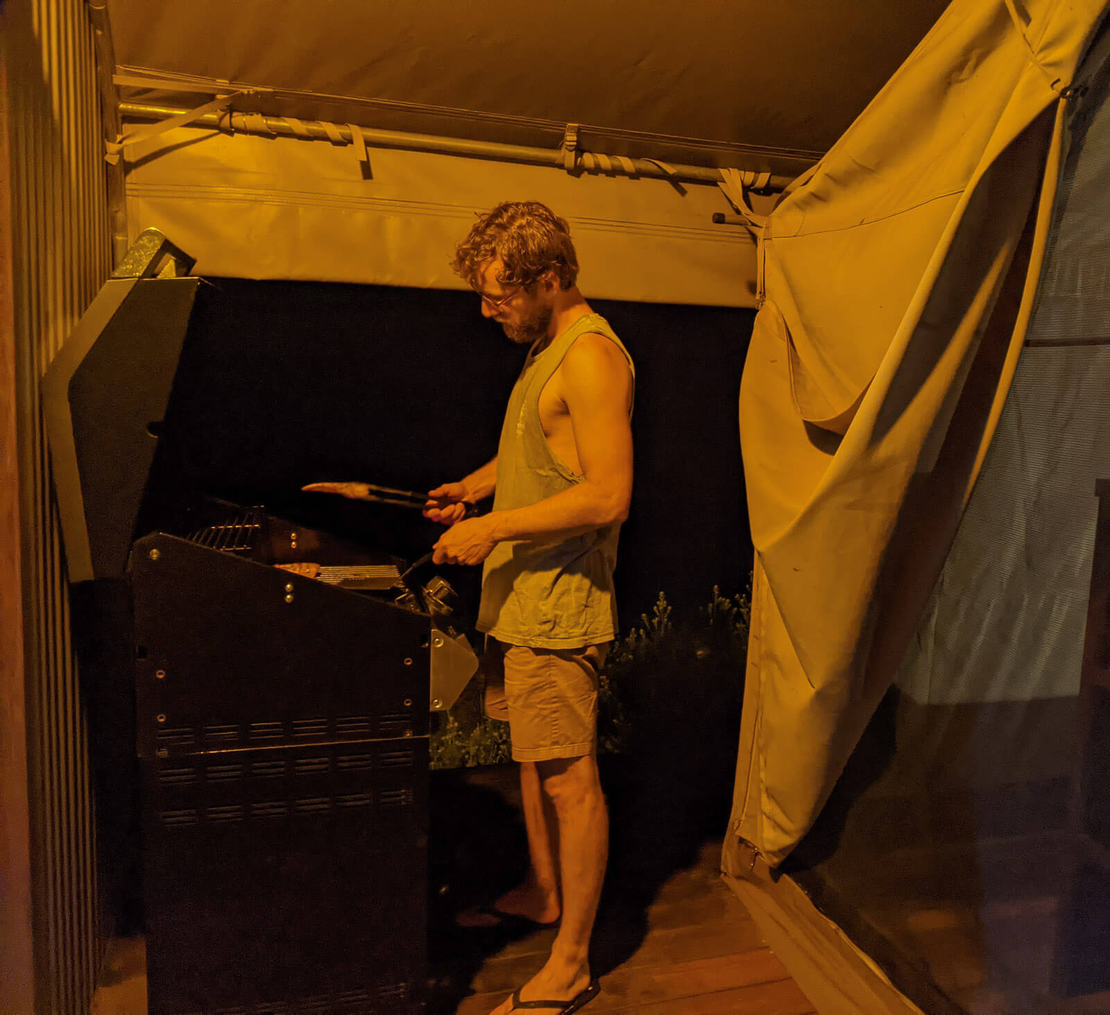 Enrico cooking dinner on the BBQ