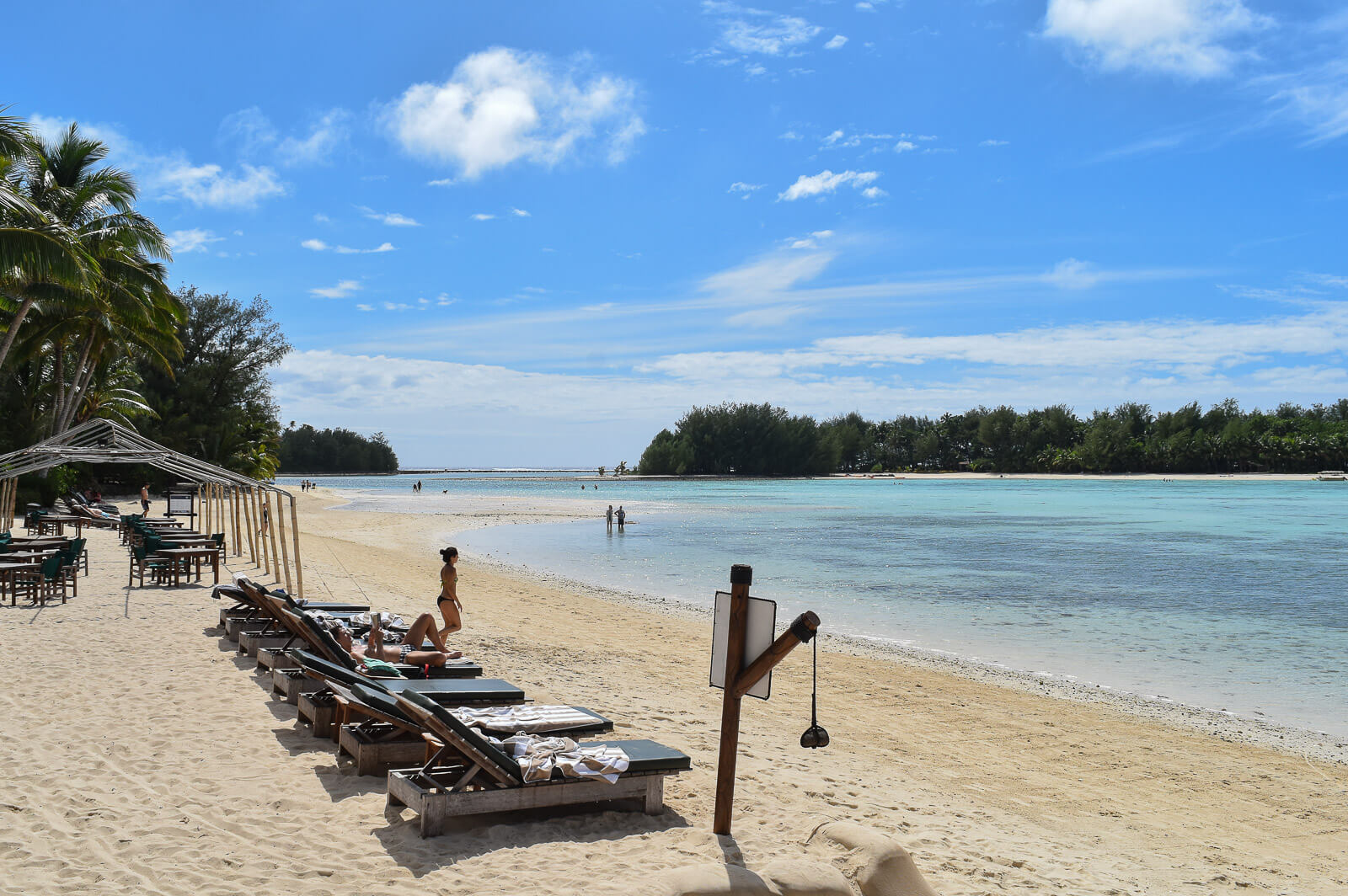 Sun loungers on a white sand beach 