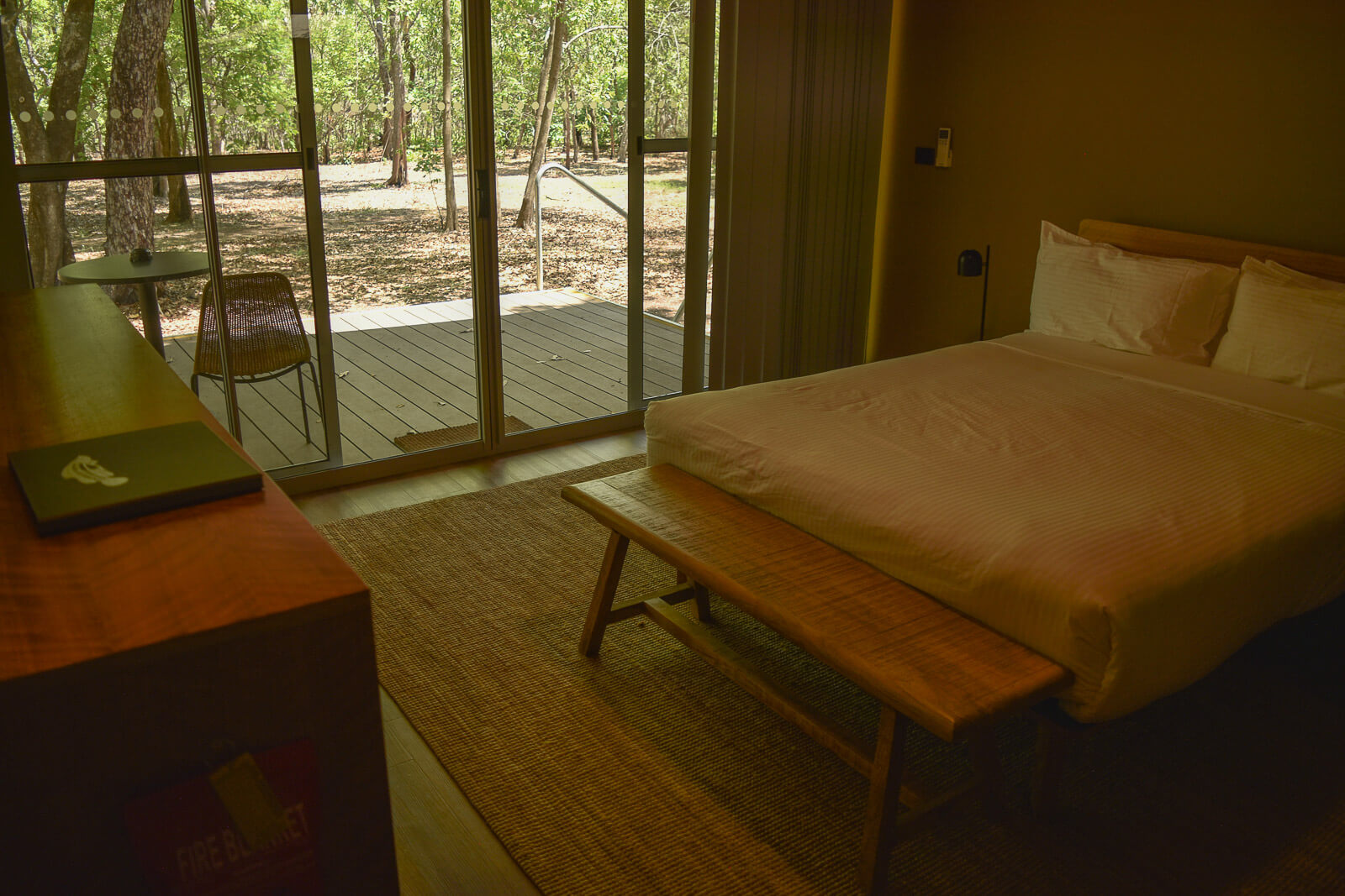 A double bed inside a glamping tent 