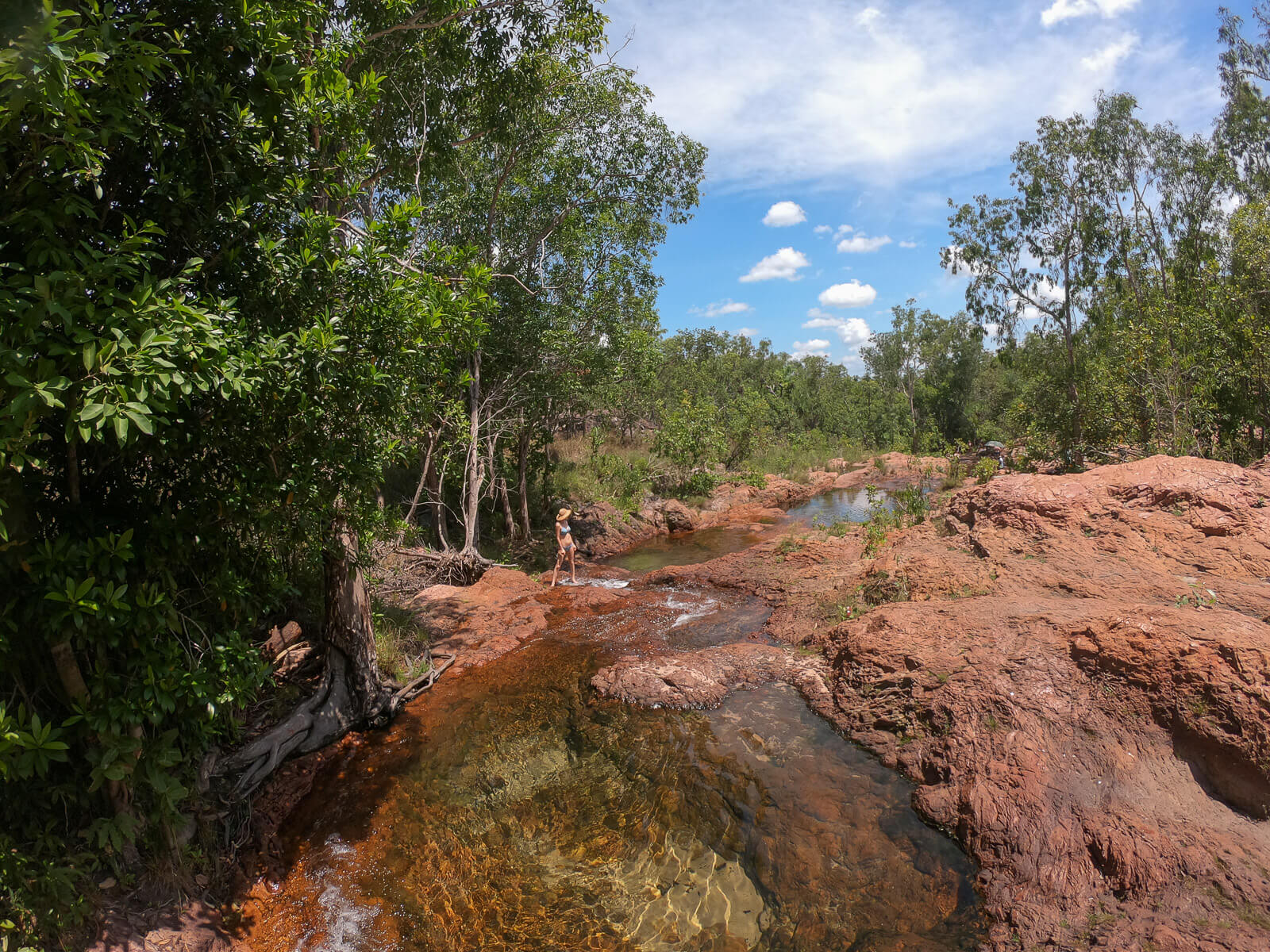 A sequence of rockpools cascading down a hill