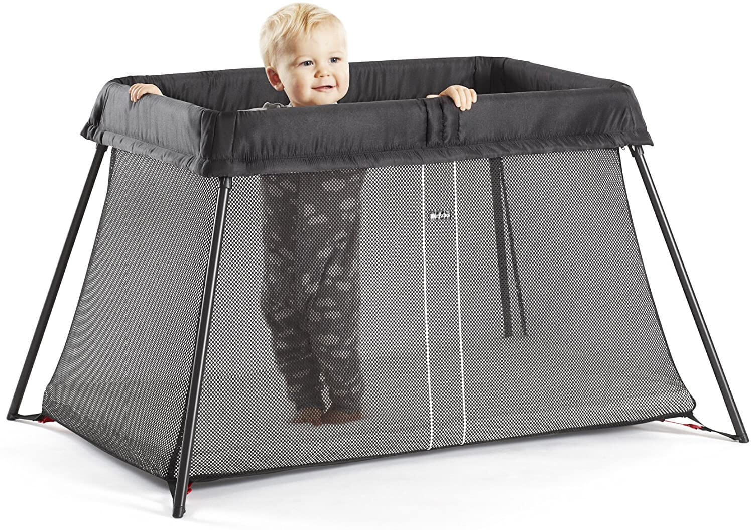 A Baby Bjorn travel cot 