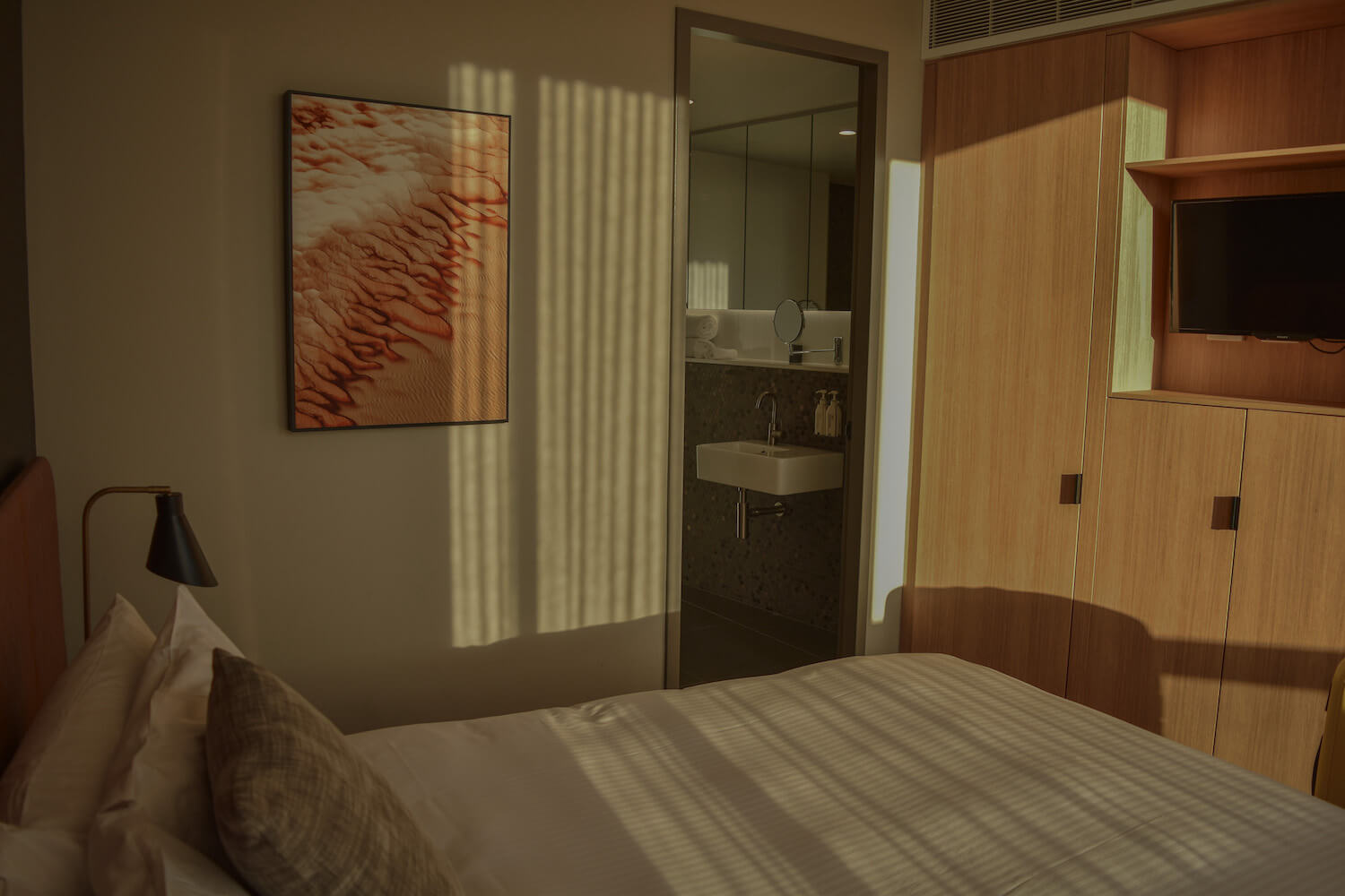 A bedroom looking into an en suite