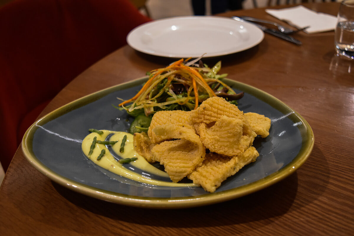 Rice flour Dusted Calamari with green papaya salad