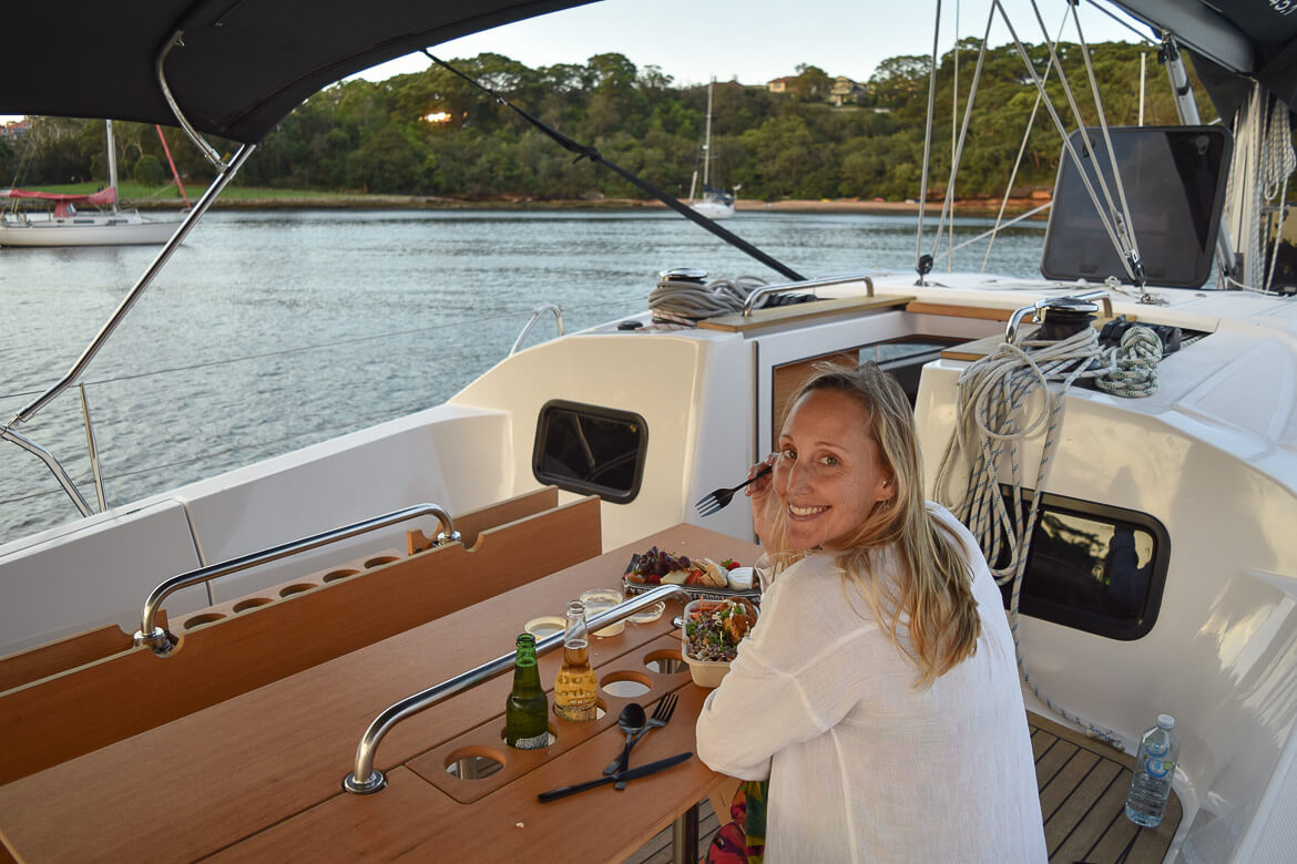 Eating dinner on the deck of a luxury yacht in Sydney