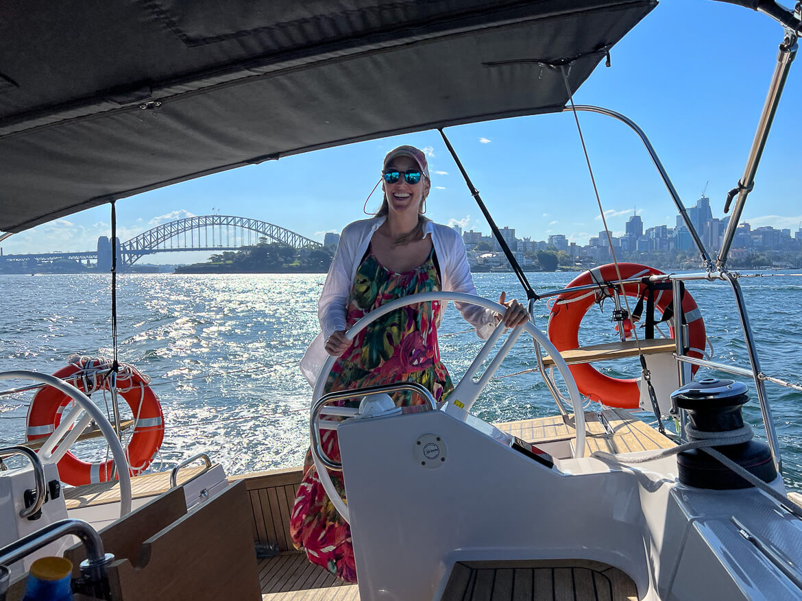 Steering a luxury yacht in Sydney 