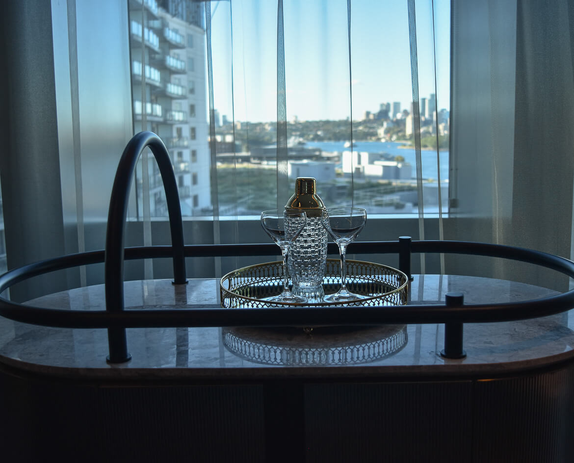 A hotel room bar overlooking Darling Harbour