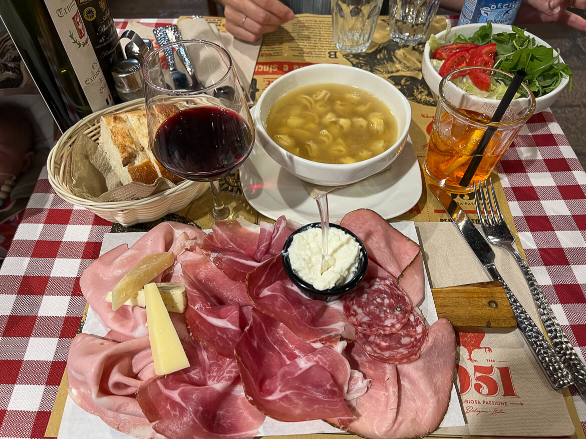 Tortellini in brodo, Mortadella and Prosciutto di Parma at 051 Bologna