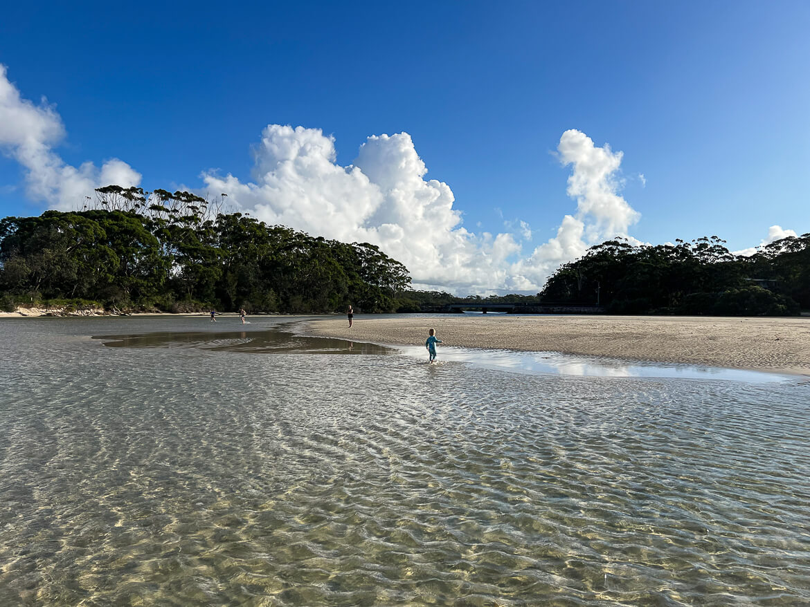 Splashing in the shallow water at Moona Moona Creek