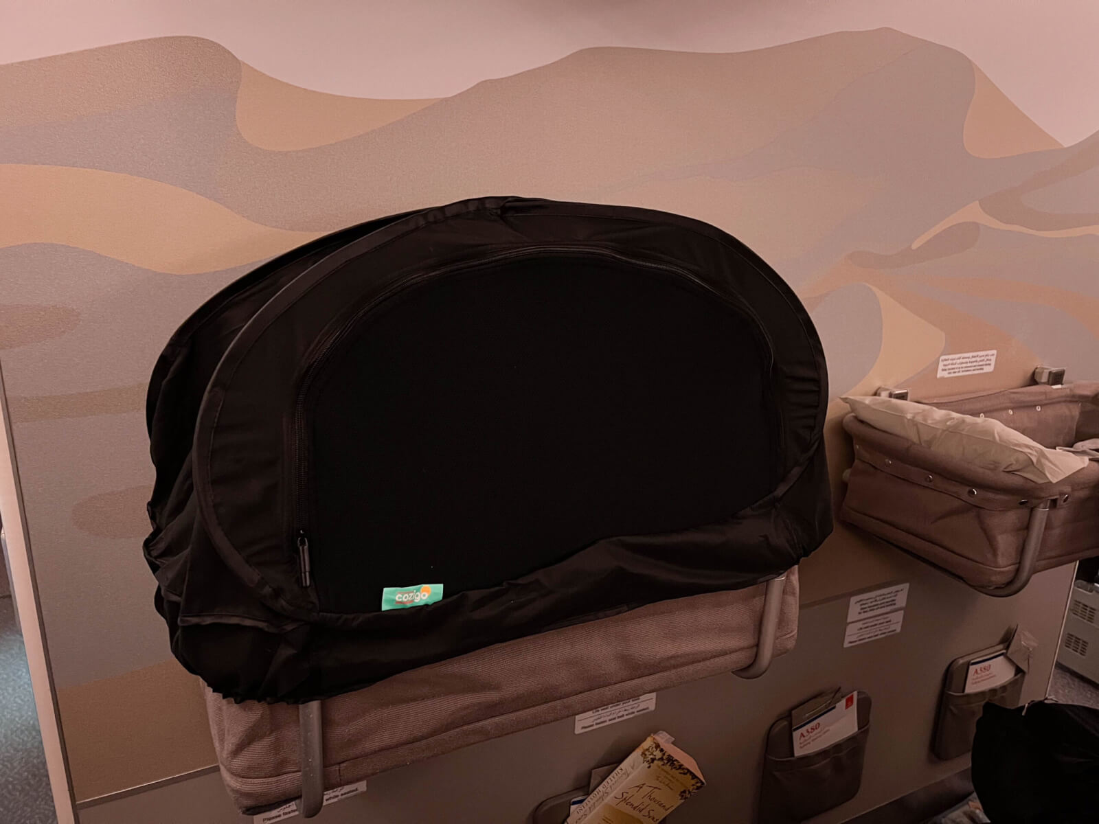 plane bassinet with a cozigo