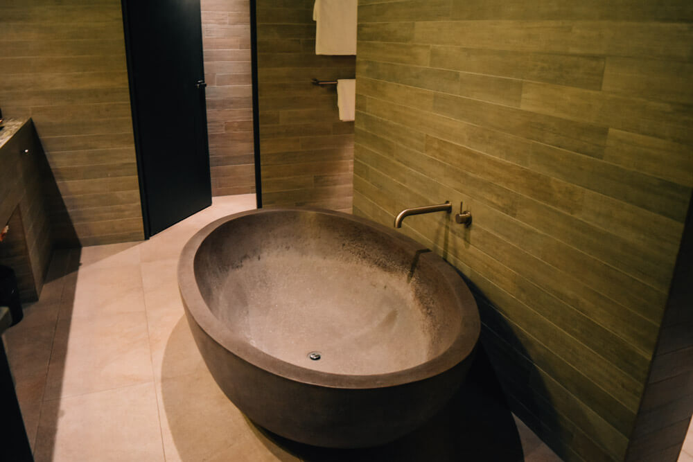 A large bath in a Canberra hotel room