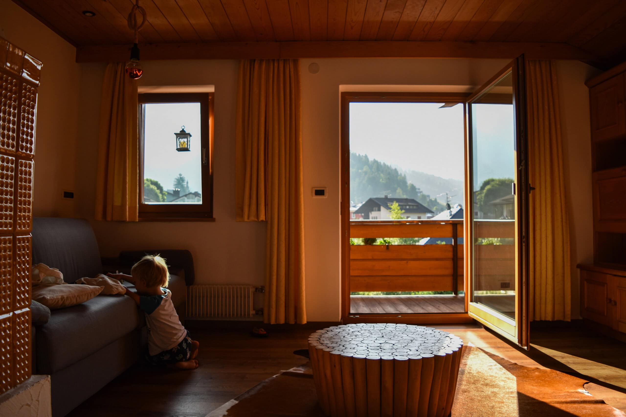 A child playing in an apartment while on holiday in Ortisei