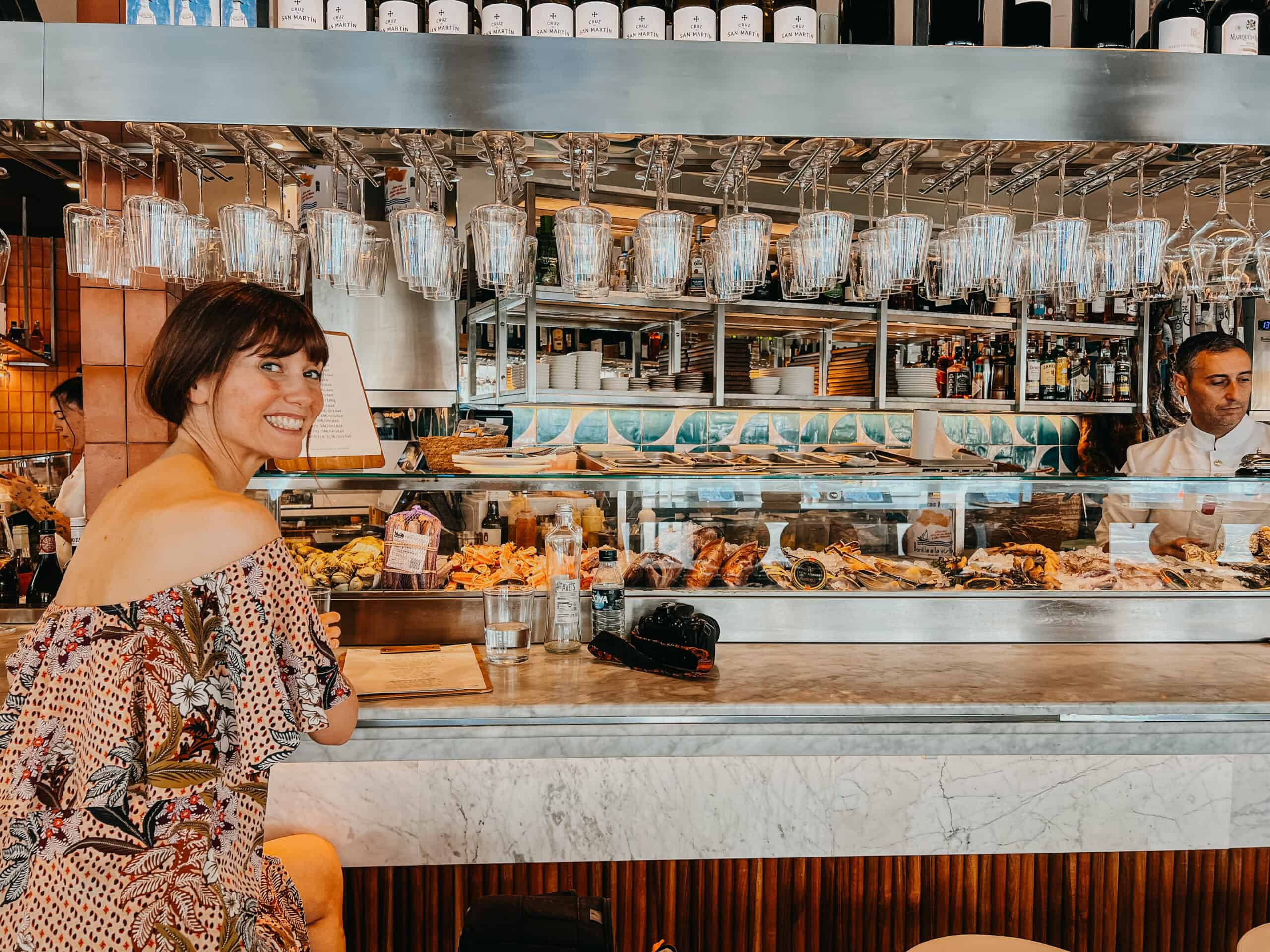 Enjoying seafood tapas at a restaurant in Seville