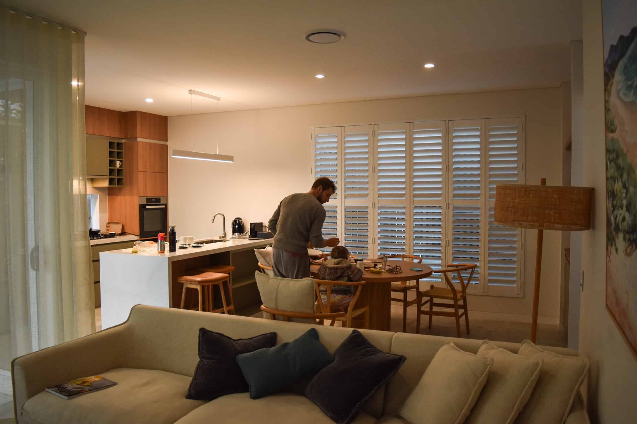 A family eating breakfast around a table