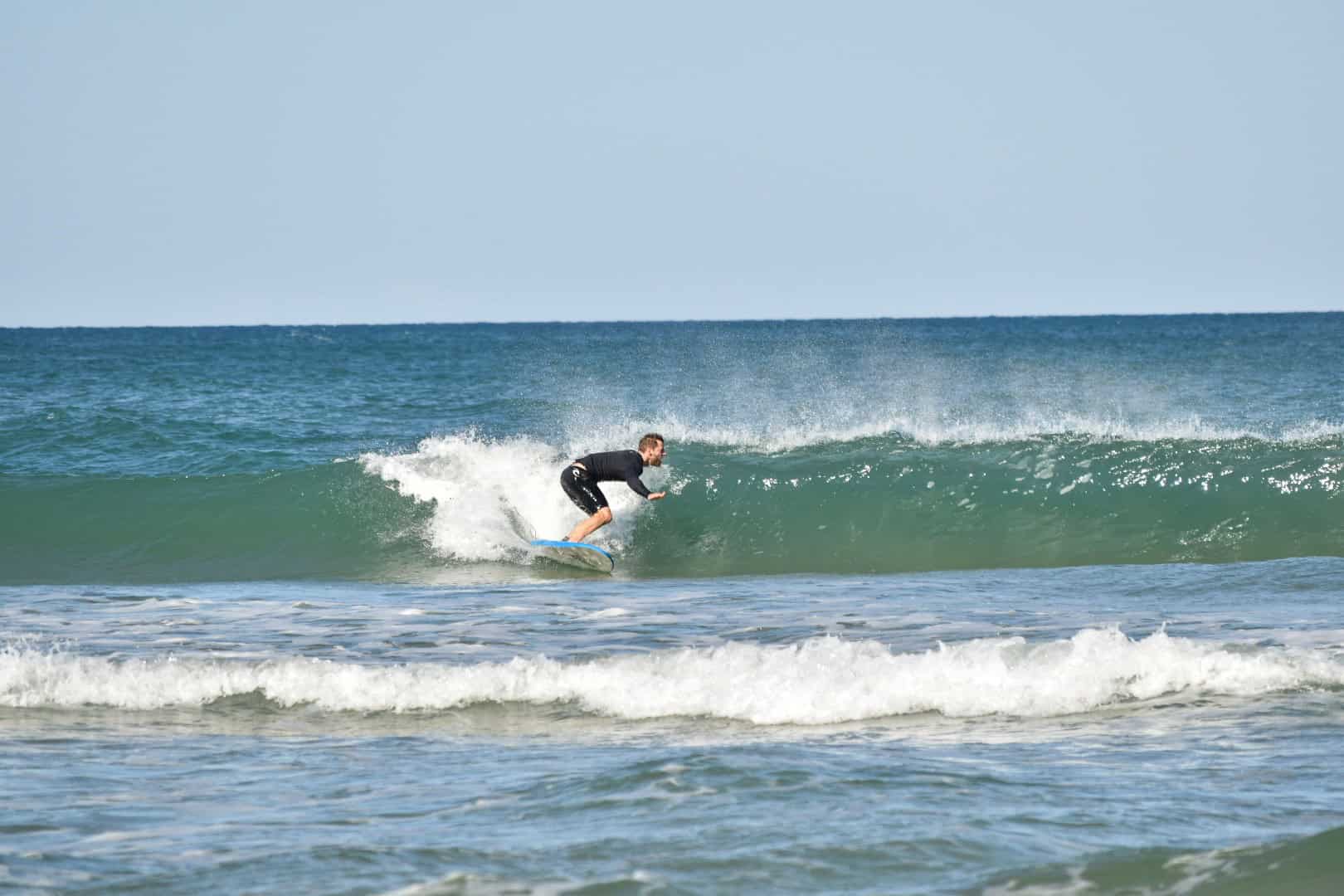A man surfing at Peregian Beach