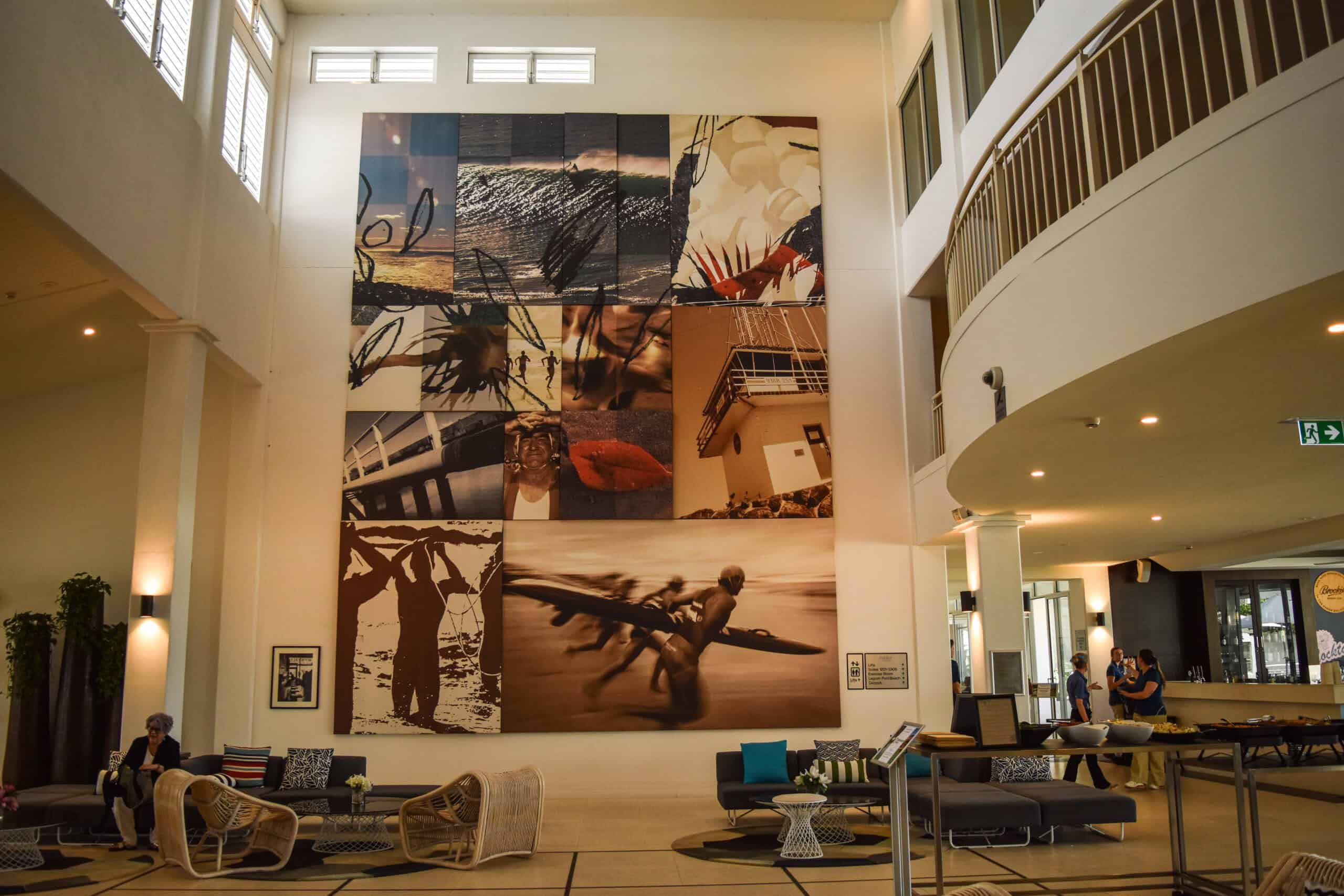 Pictures of surfers in the lobby of a Tweed Hotel