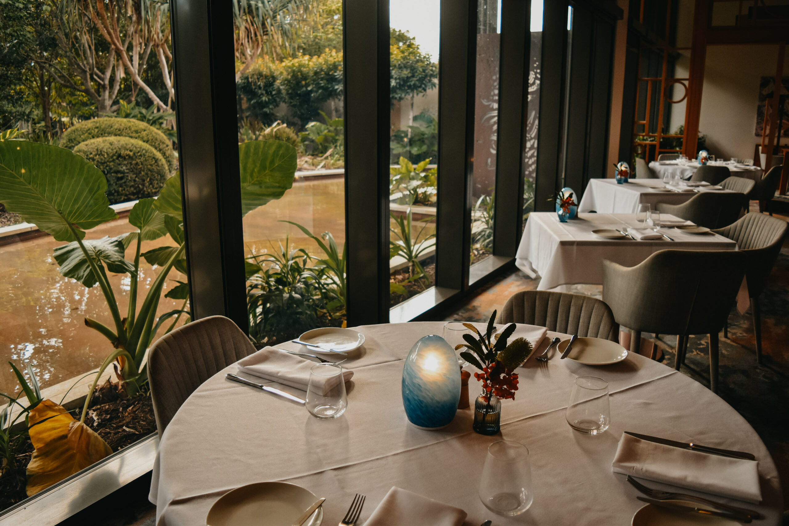 A beautiful table setting overlooking a water feature