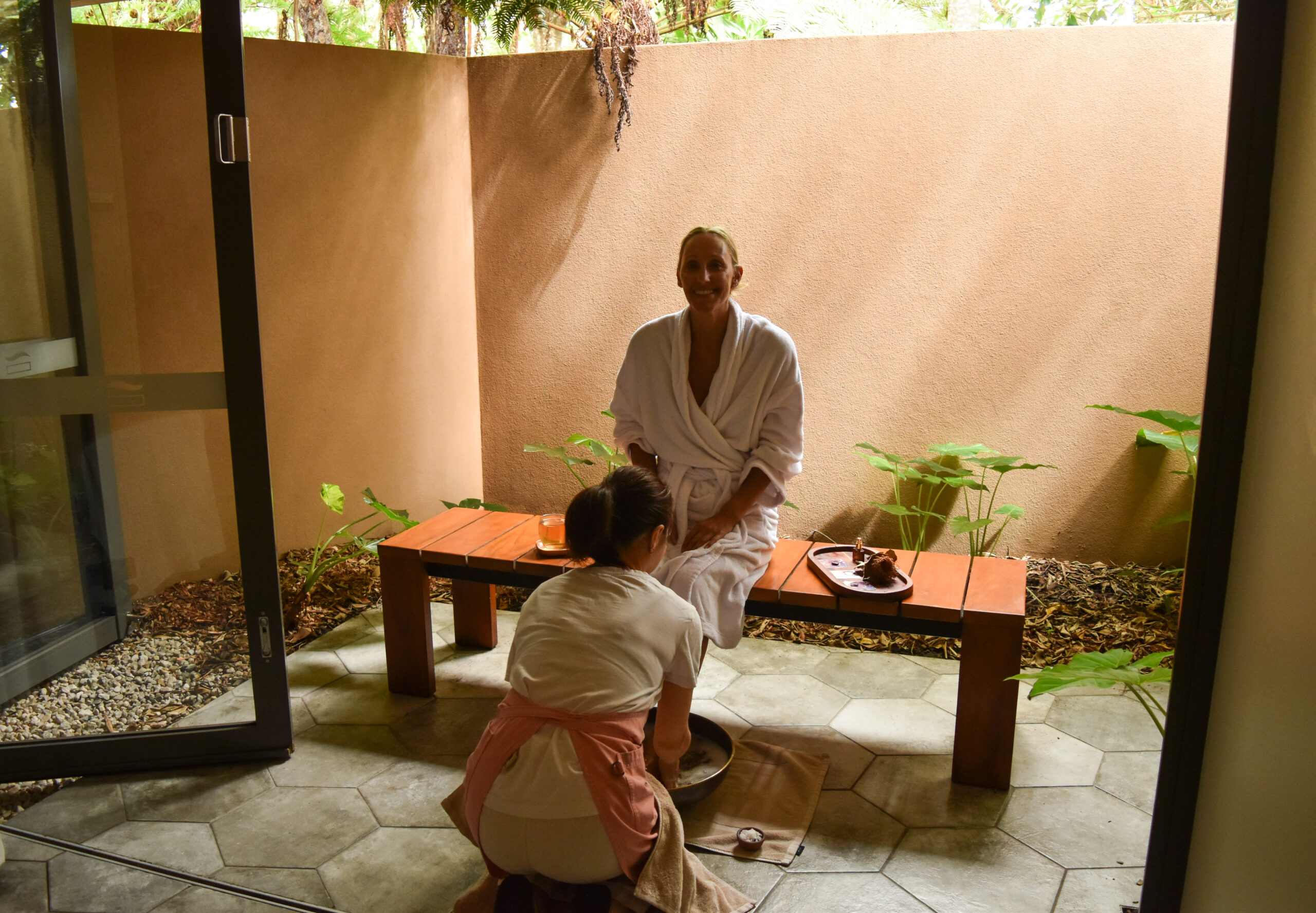 A woman enjoying a spa treatment at Elements of Byron